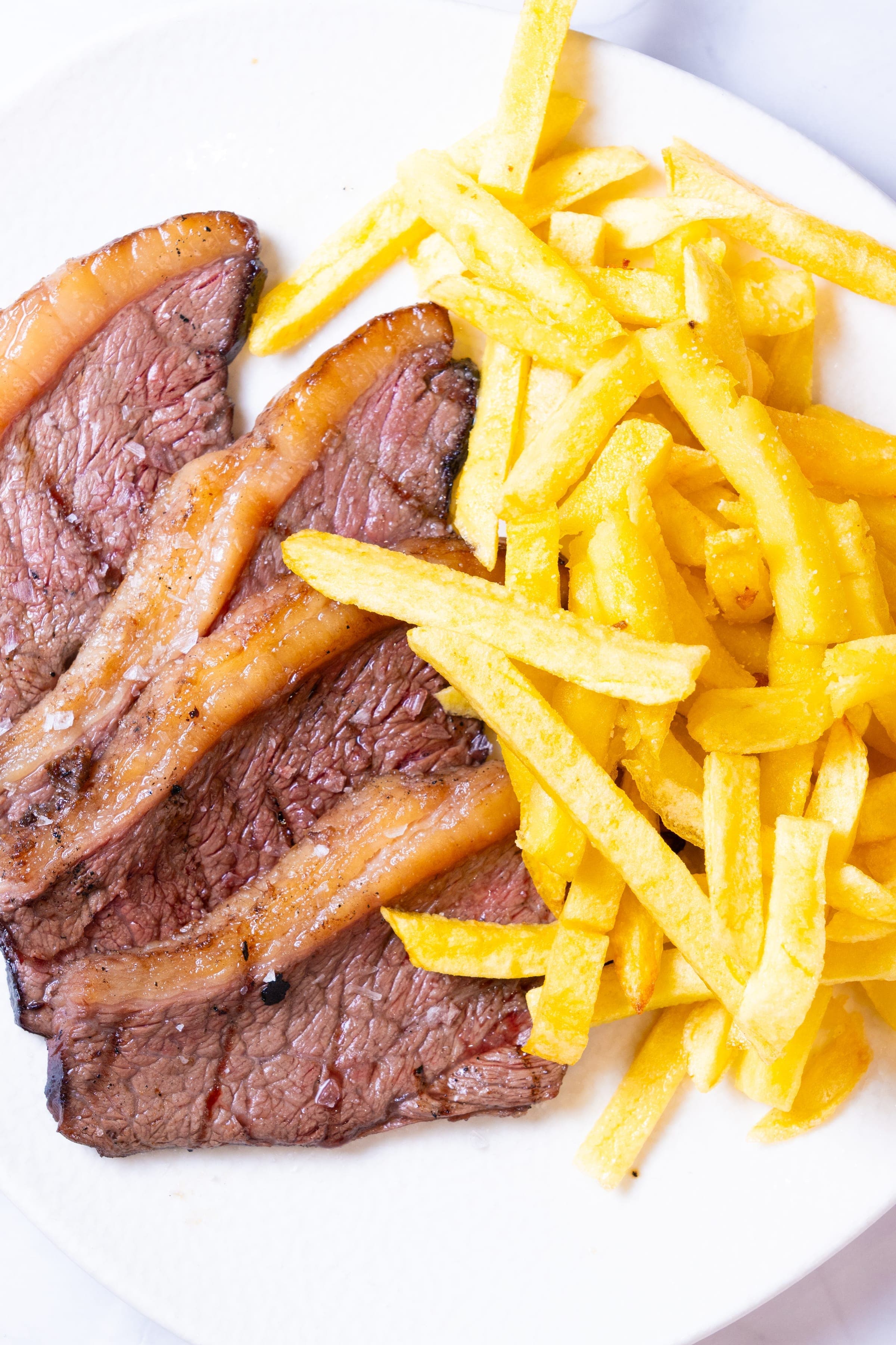 Carne a la brasa a domicilio en Vigo — Delfín Delivery