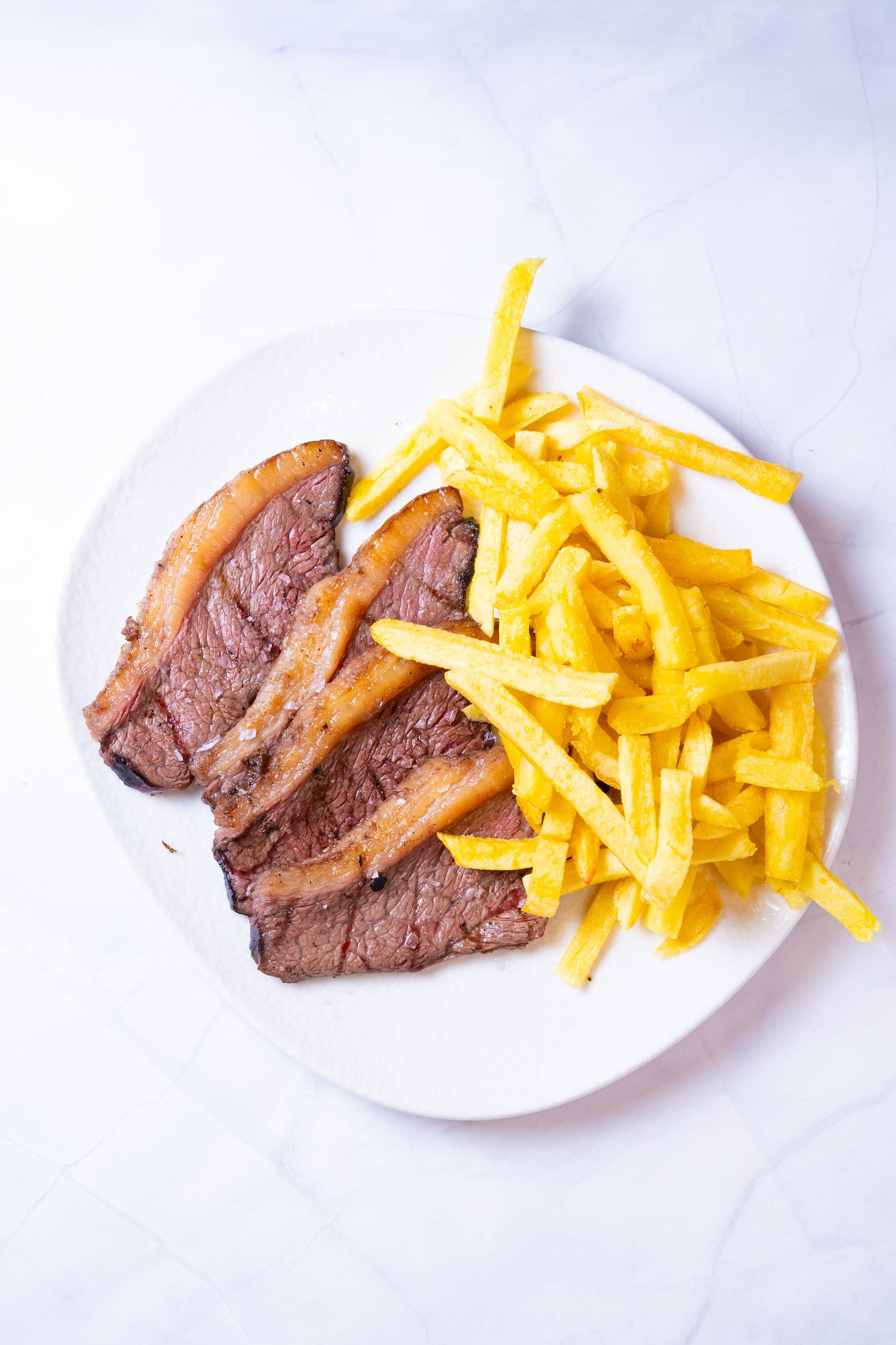 Carne a la brasa a domicilio en Vigo — Delfín Delivery